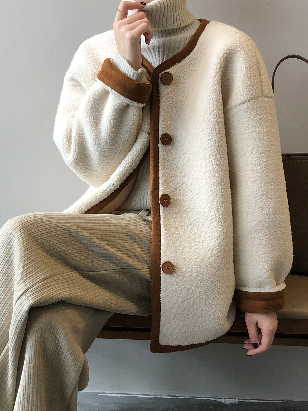 Manteau en laine avec fourrure polaire