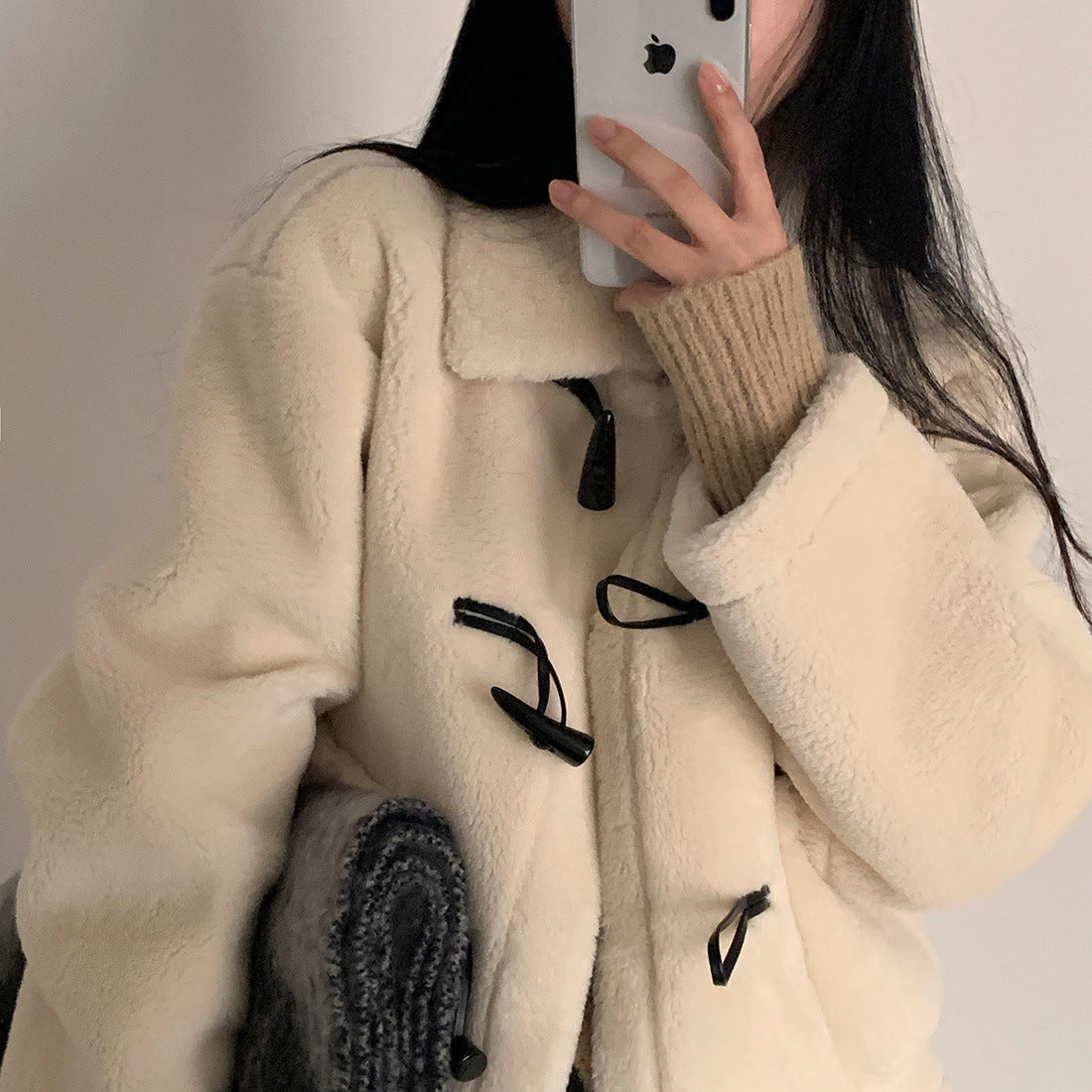 Veste courte ample en laine d'agneau doublée