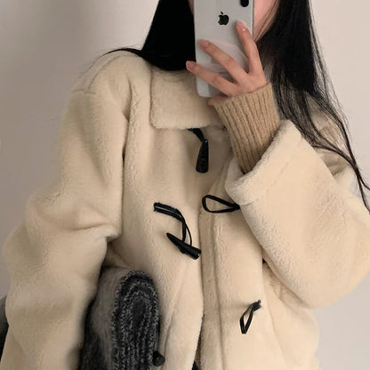 Veste courte ample en laine d'agneau doublée