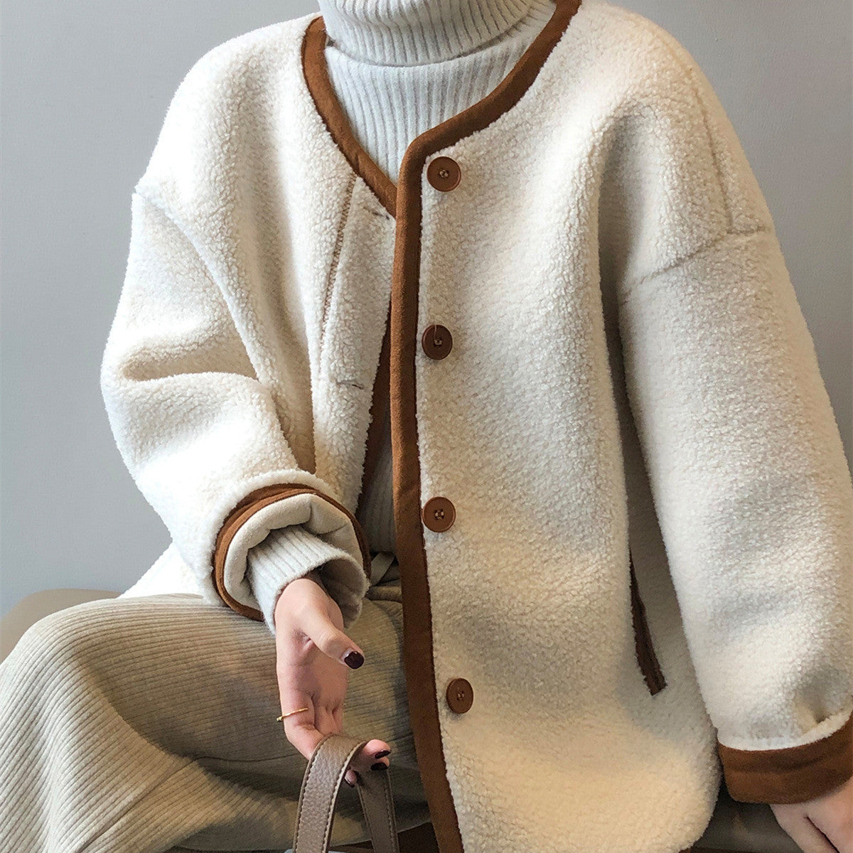 Manteau en laine avec fourrure polaire