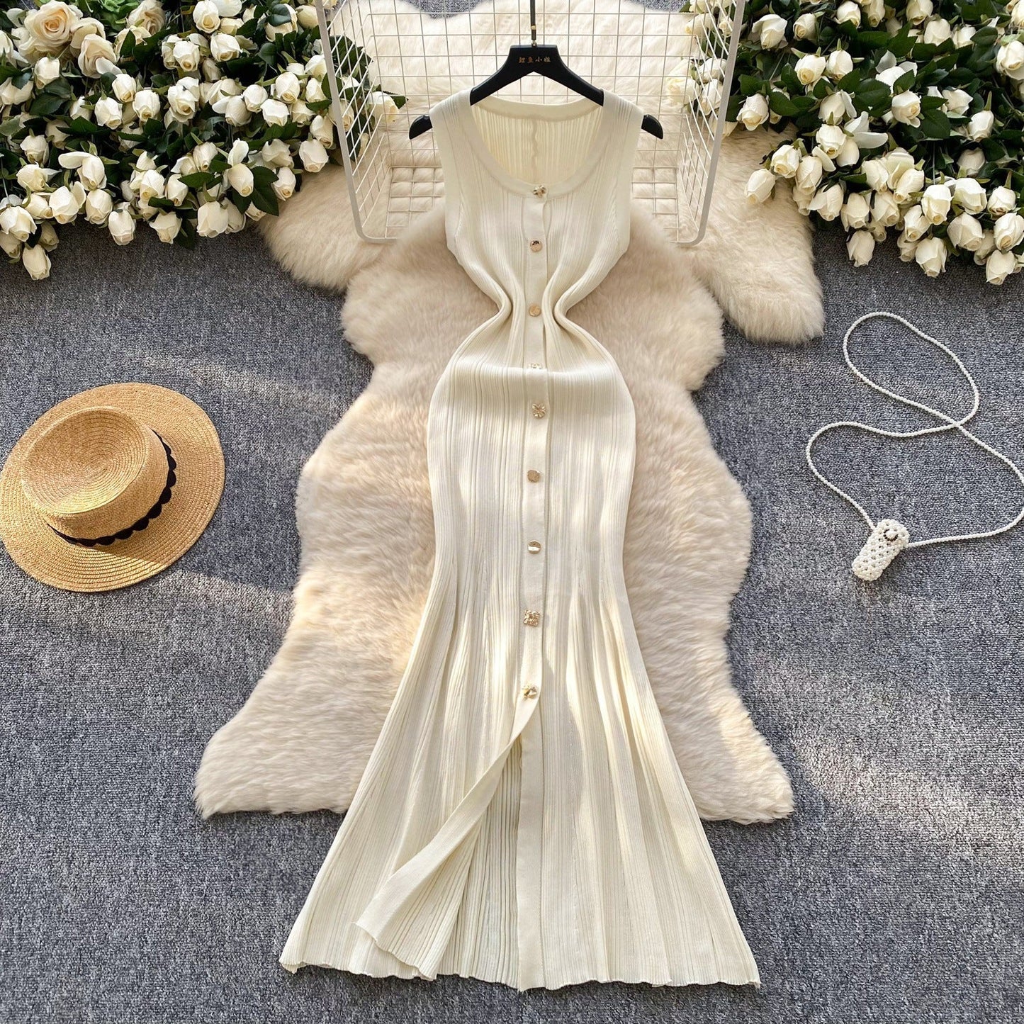 Robe en tricot sans manches à col rond