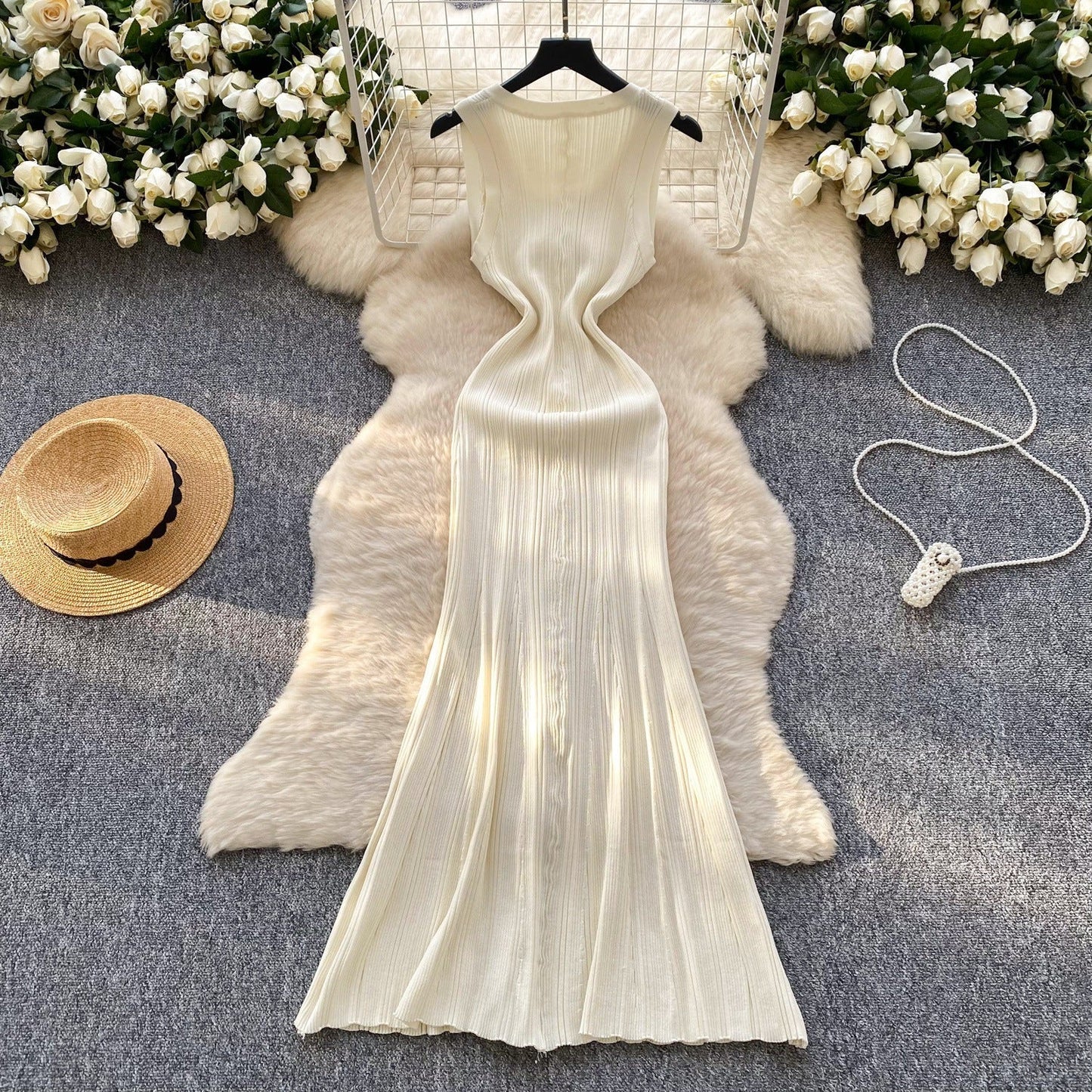 Robe en tricot sans manches à col rond